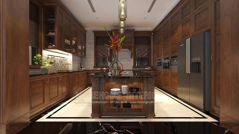 Tủ bếp chữ L gỗ óc chó được thiết kế một cách linh hoạt và khéo léo, kết hợp bàn bàn đảo được đặt ở chính giữa tạo sự bề thế, sang trọng cũng như đẳng cấp của chủ nhân ngôi nhà Tủ bếp chữ L